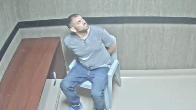 Nathan Gingles looks around after he was placed in an interrogation room. Gingles was arrested and charged with the Feb. 16, 2025, murders of his wife, her father and a neighbor in Tamarac, Florida. 